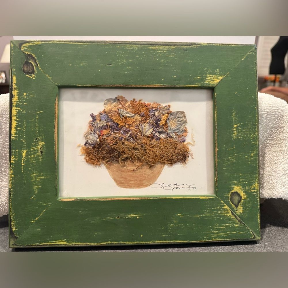 Vintage dried flower art with rustic wooden frame